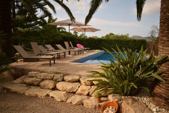 Resort-style pool with palms in Mallorca