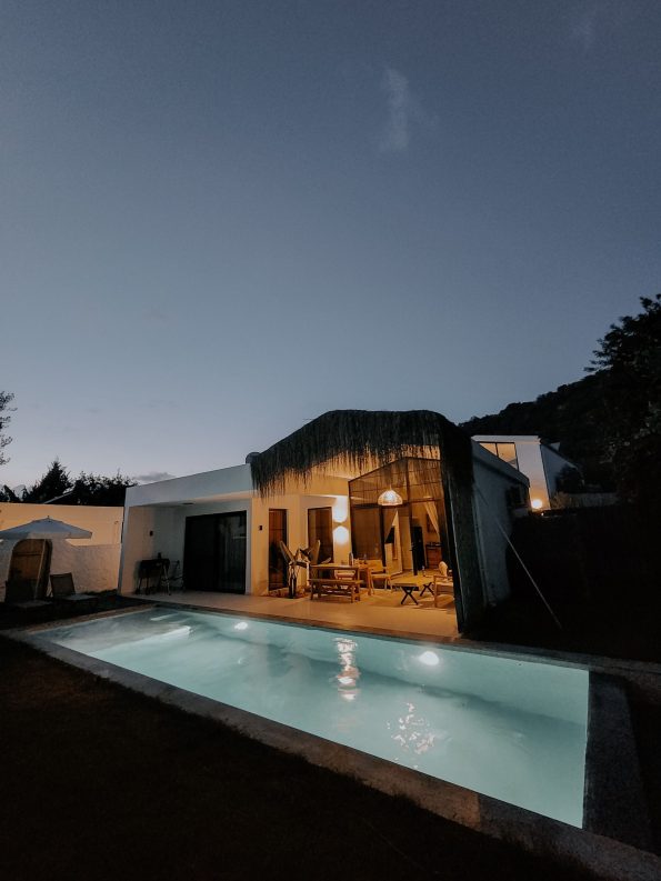 Illuminated villa pool at night in Mallorca
